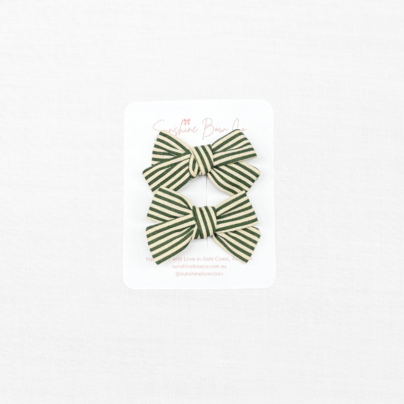 green strip pigtail bows.