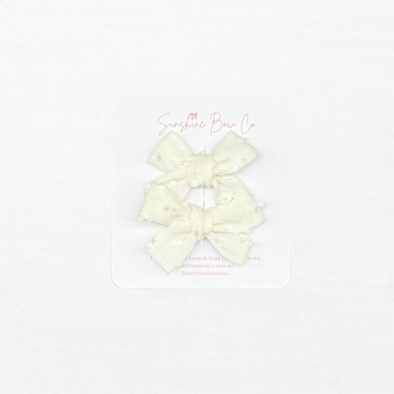 white silk hair bows pigtails.